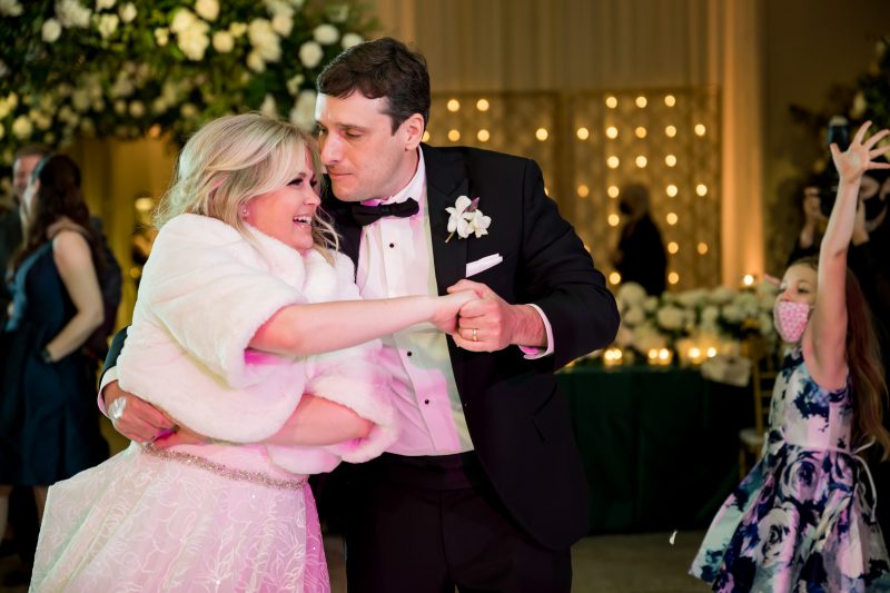 bride and groom dancing