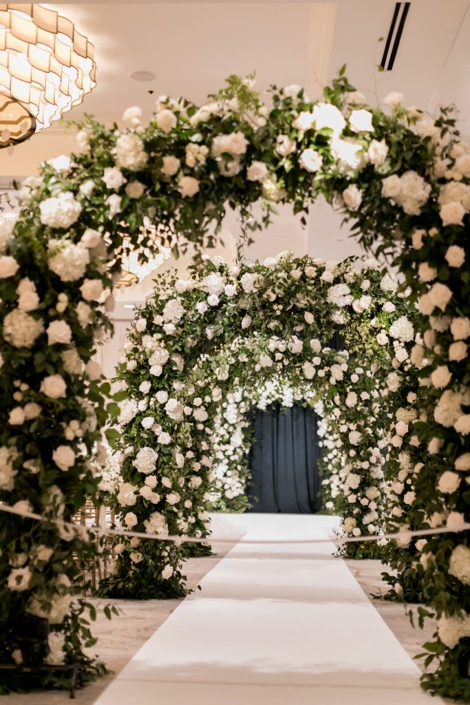 white floral arches