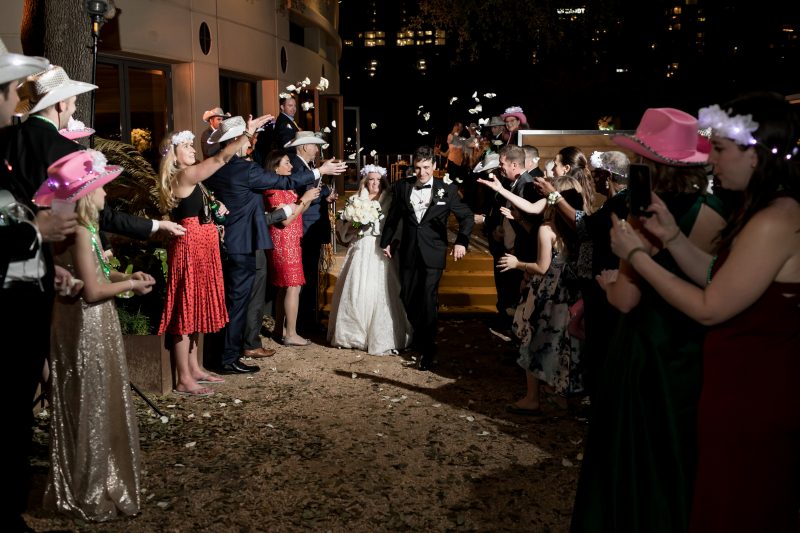 bride and groom exiting the reception