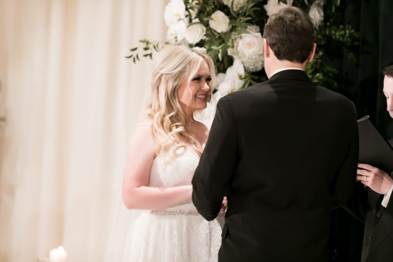 bride and groom at the altar