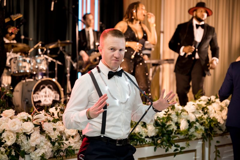 guest dancing at the reception