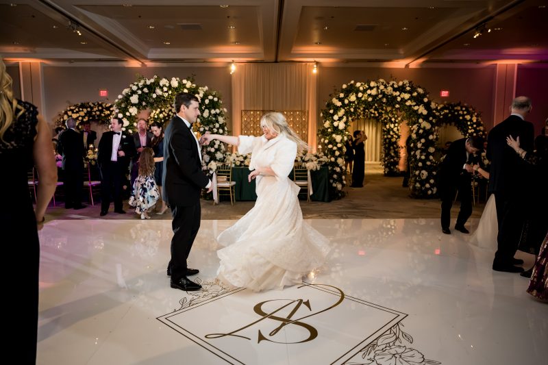 bride and groom dancing