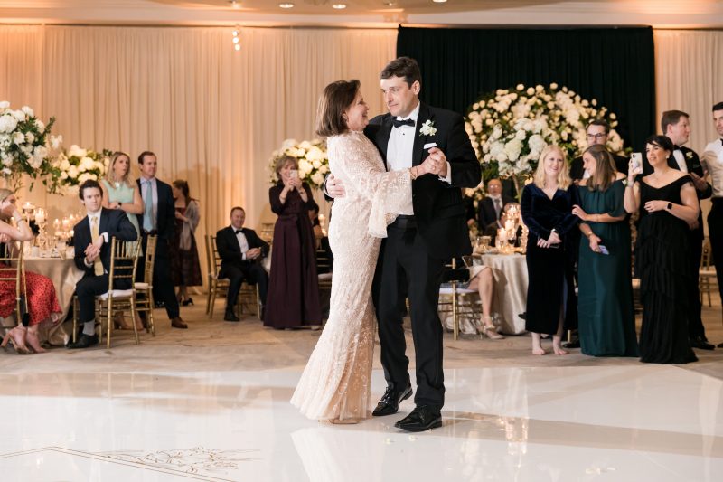 mother of the groom dancing with the groom