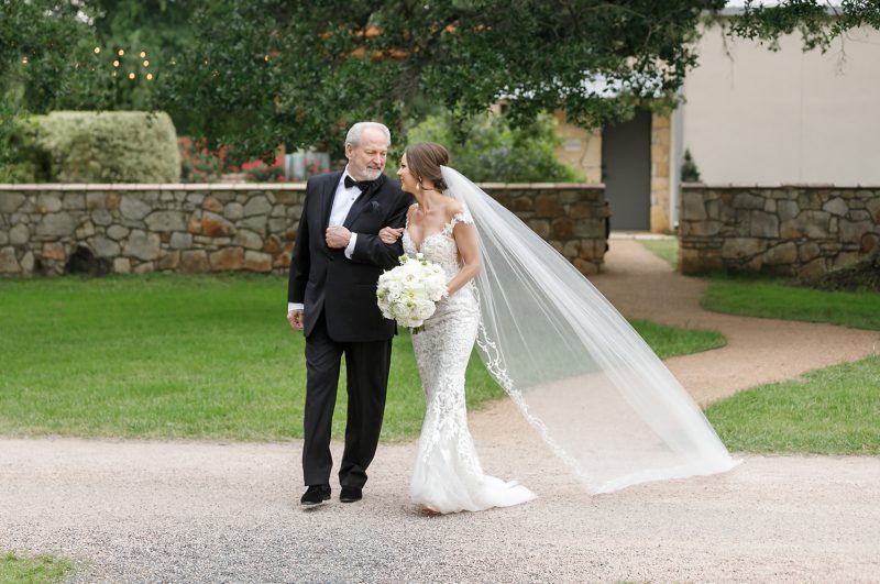 father of the bride walking her down the aisle
