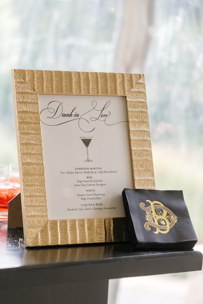 bar menu in gold frame with the words drunk in love across the top