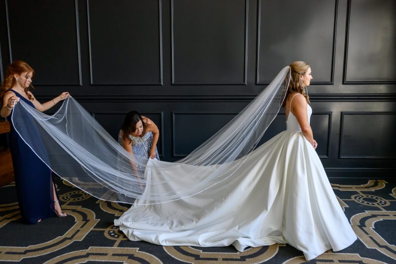 bride with bridesmaids at Austin Country Club wedding
