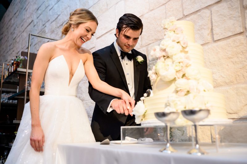 cutting the cake at Omni Barton Creek Wedding