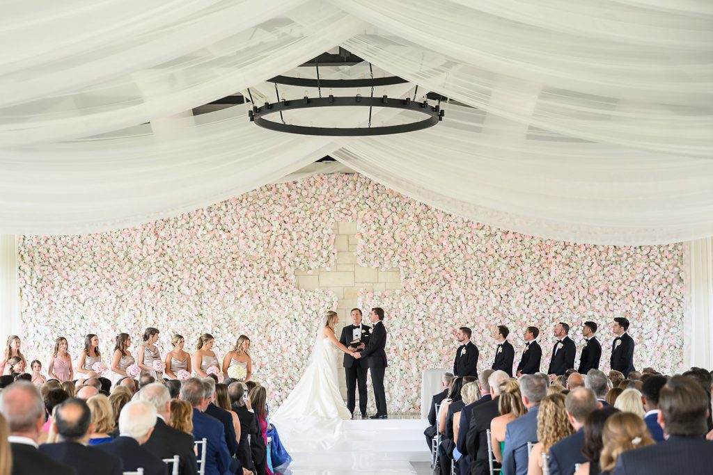 A stunning white wedding ceremony set up at the Omni Barton Creek Resort