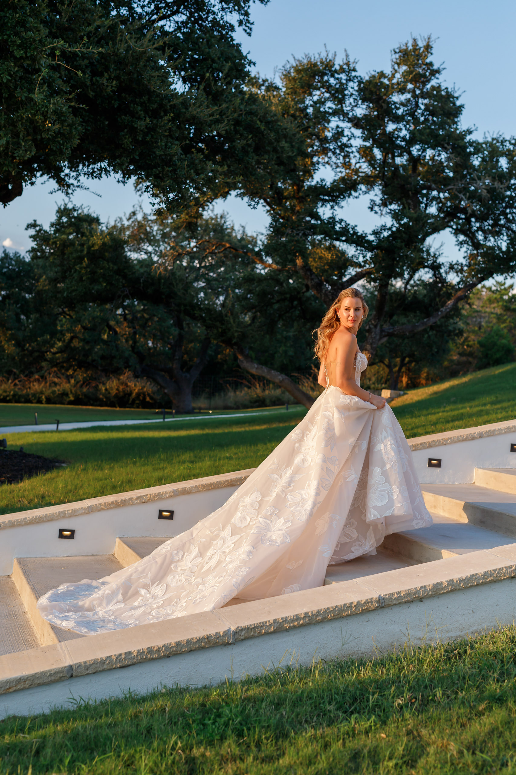 Bride walking up the steps at the Arolo