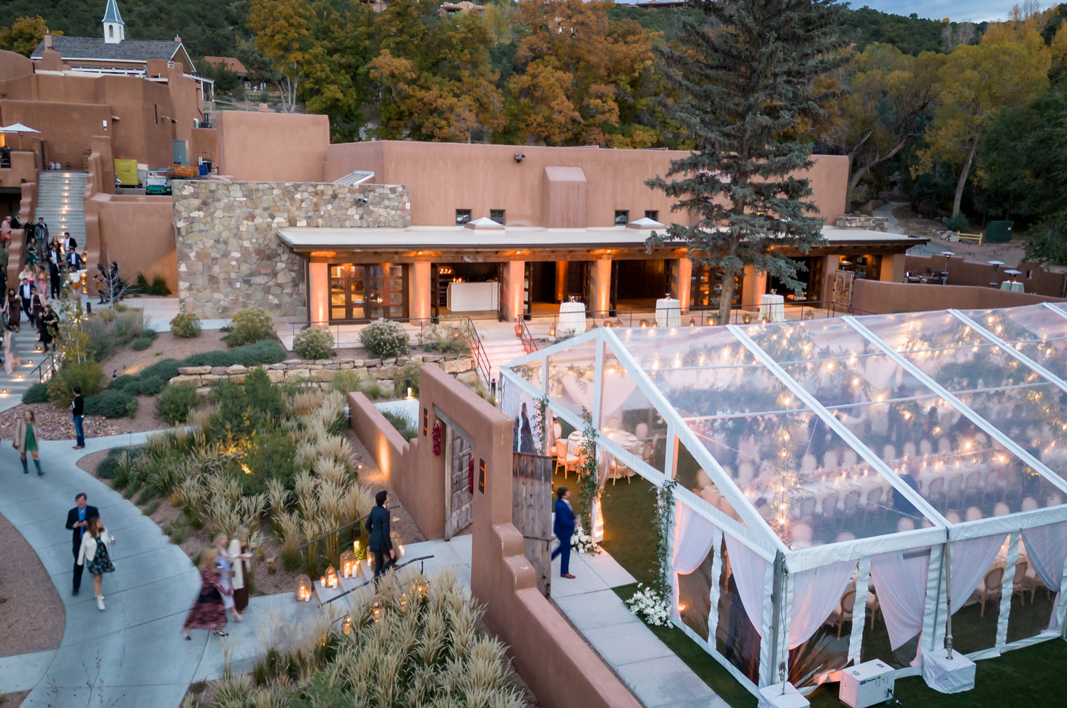 Outdoor wedding reception at Bishop’s Lodge in Santa Fe photographed at dusk