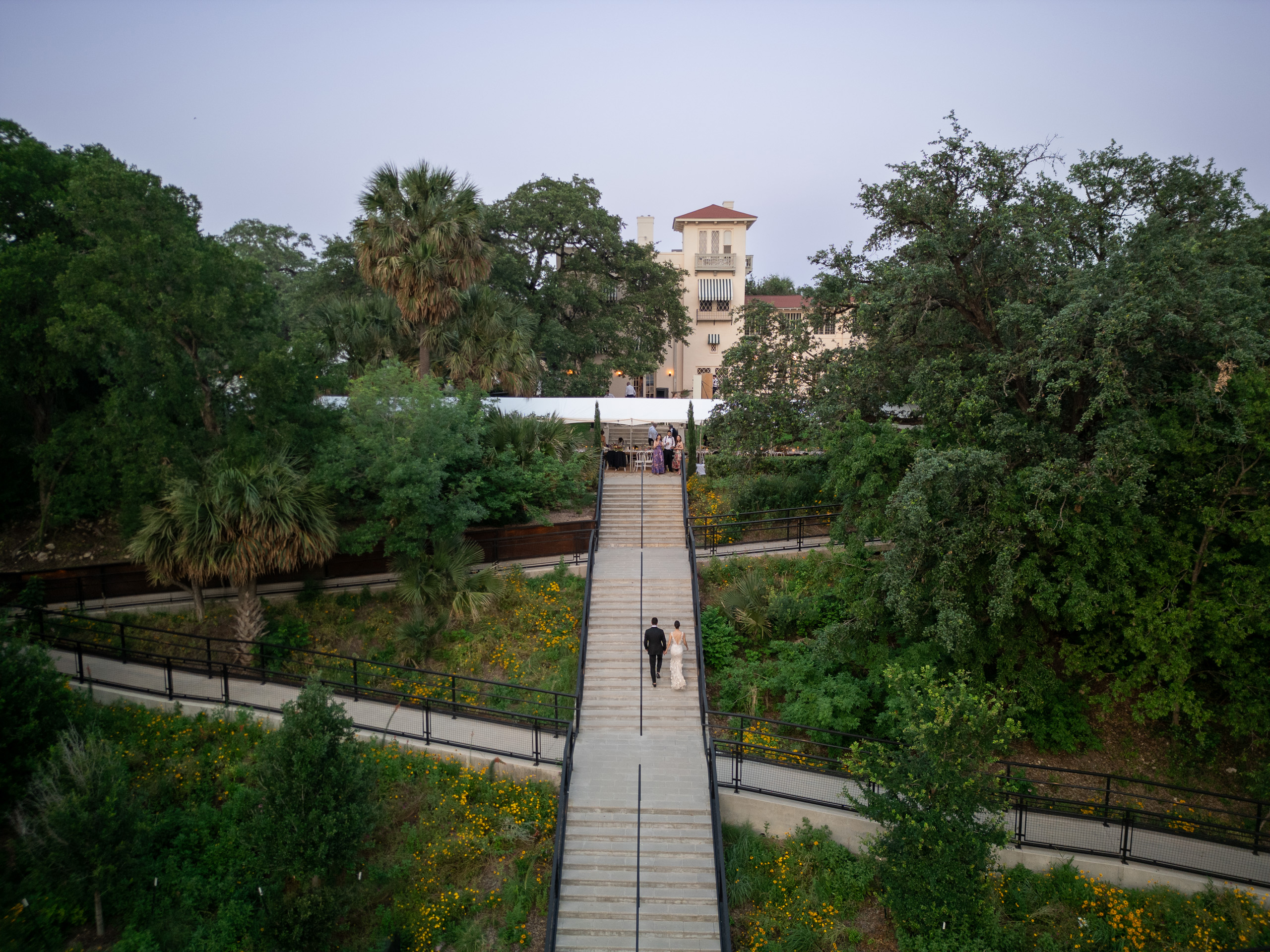 Aerial view of a luxury Texas wedding venue and outdoor celebration