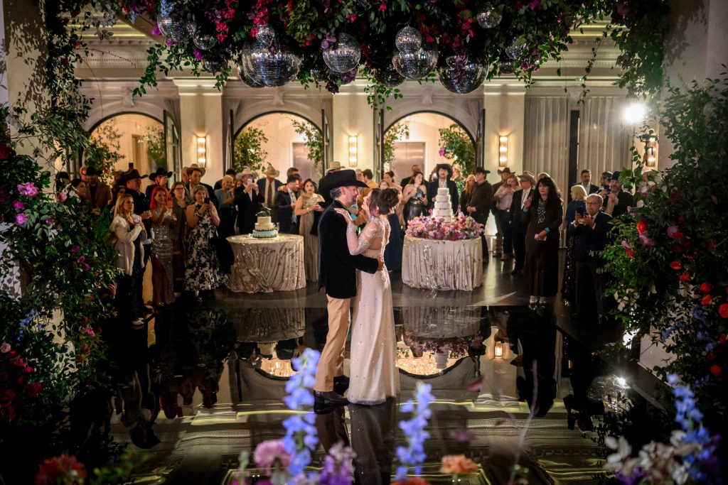 Guests gathered inside Le Tesserae during Bailey and Alton’s Houston wedding reception.