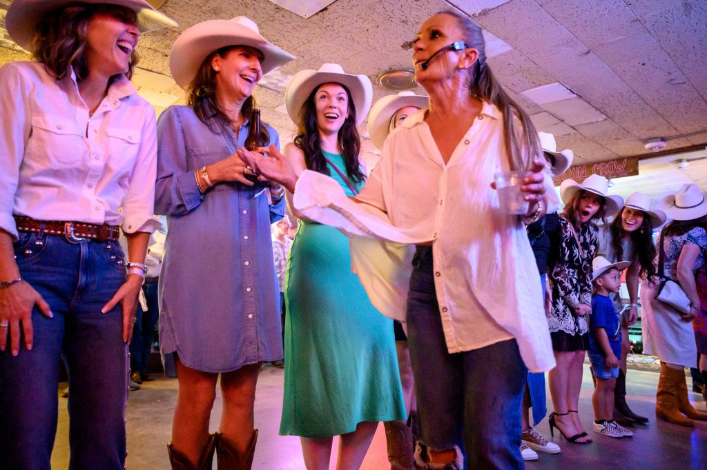 Guests enjoying dancing lessons at the broken spoke