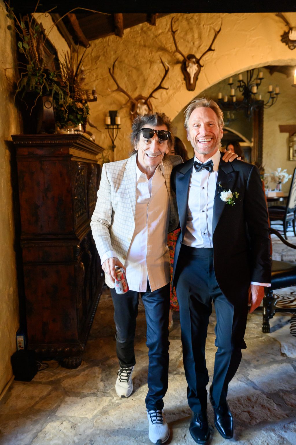 Ronnie Wood visiting the groom before the wedding ceremony