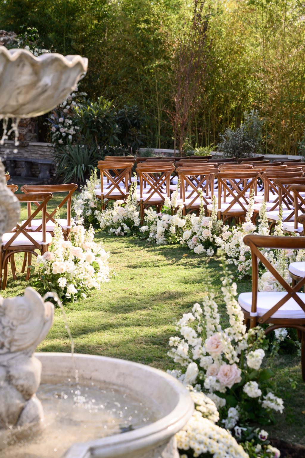 White floral garden ceremony design by Remi and Gold