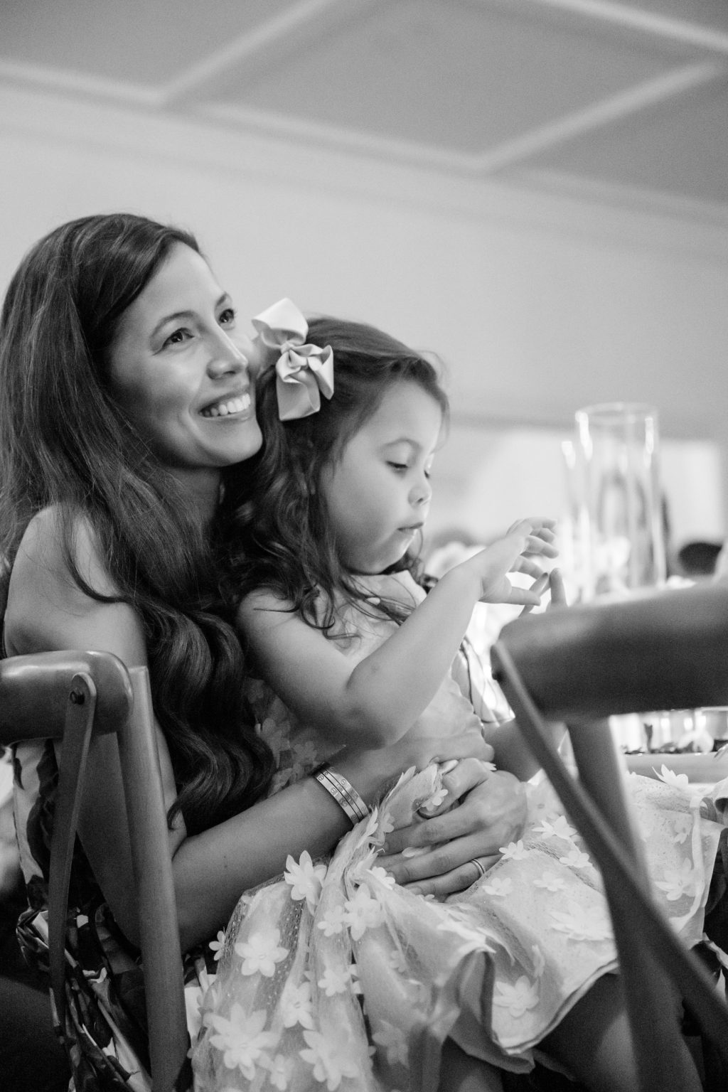 Black and white candid family moment during an Austin wedding weekend