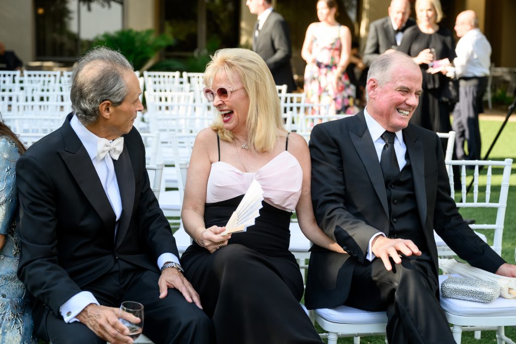 Wedding guests seated for an outdoor ceremony at Four Seasons Austi