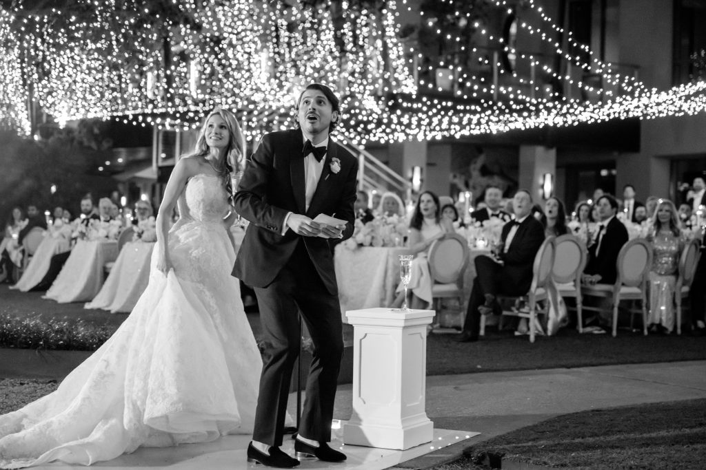 Candid of the groom surprised by the firewooks
