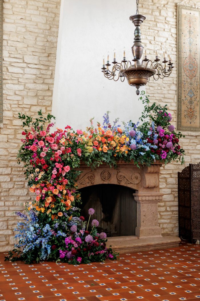 Rainbow ombre floral over a mantle