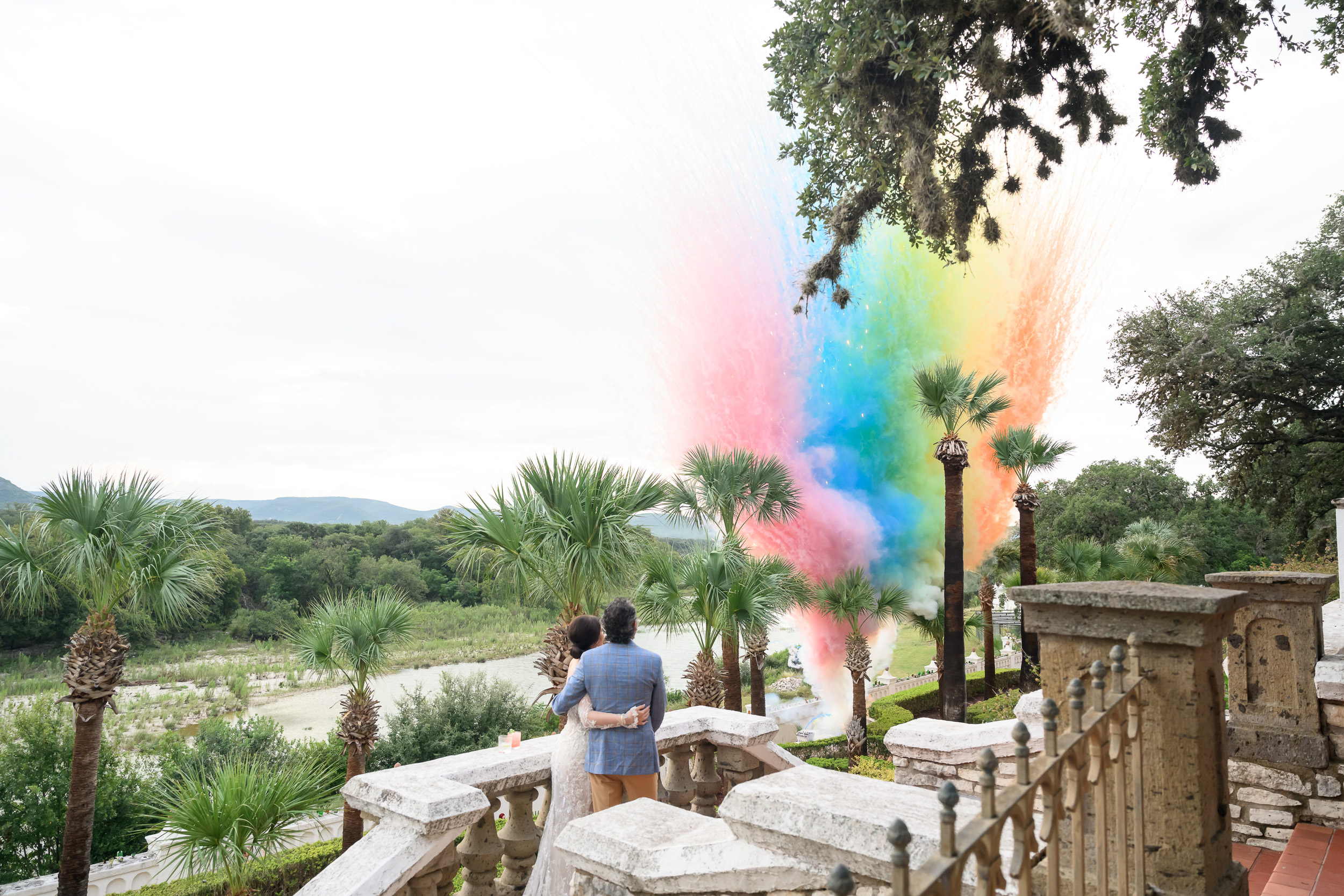 Private ranch wedding with a surprise color bomb pyro for guests at the este