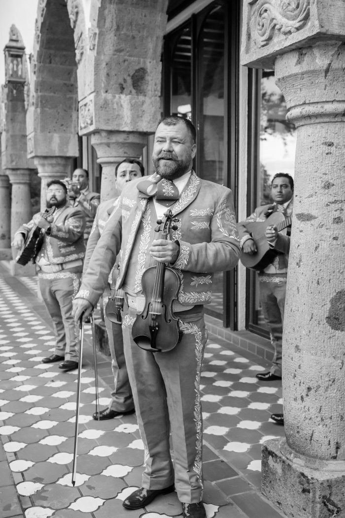 black and white documentary photo of the mariachi band