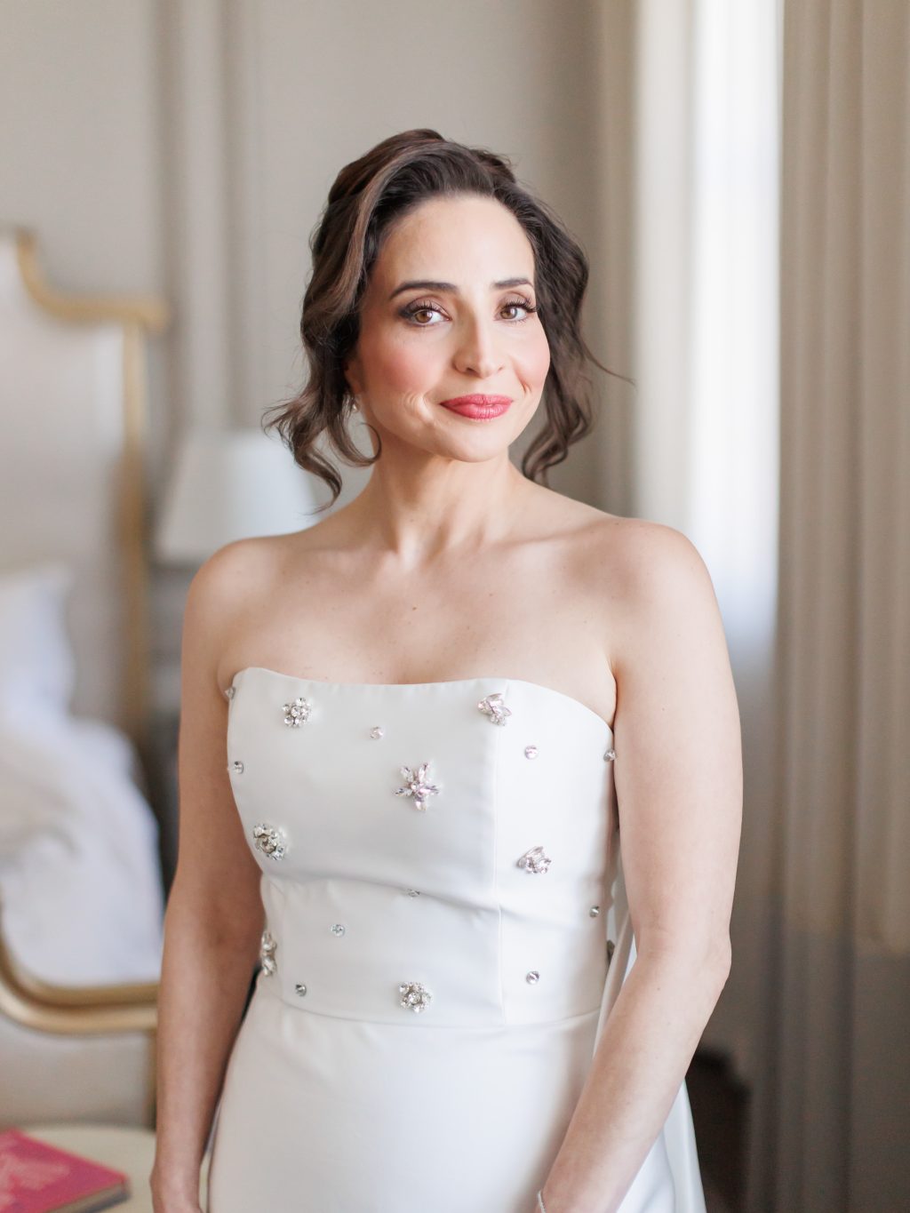 Bride wearing a strapless embellished wedding dress at The St. Anthony Hotel in San Antonio