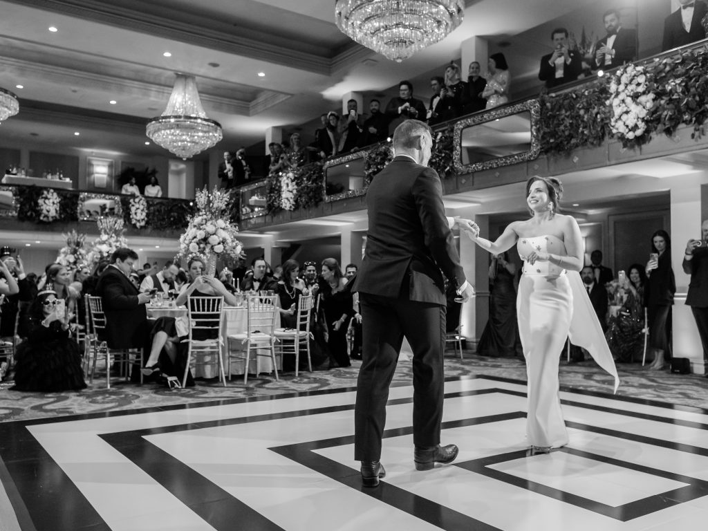 Black and white photograph of the bride and groom’s first dance at The St. Anthony Hotel