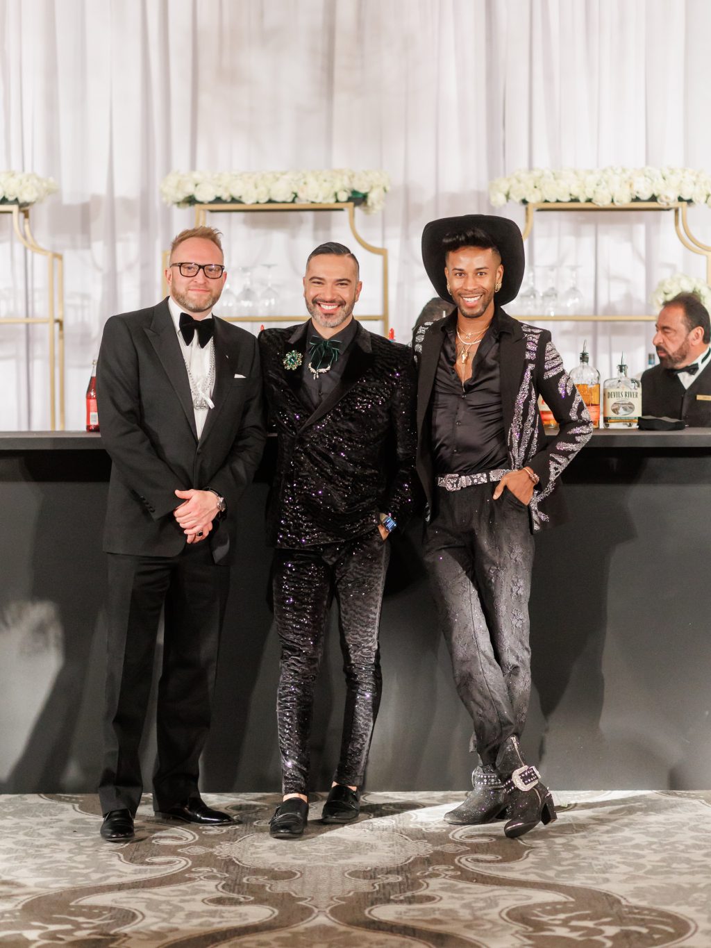Stylish wedding guests during the New Year’s Eve reception at The St. Anthony Hotel