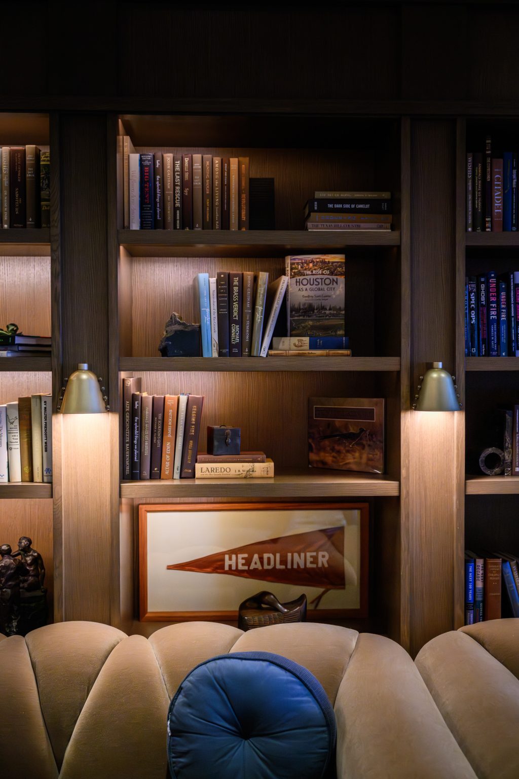 Library-inspired interior and Headliners Club sign at the couple’s Austin rehearsal dinner