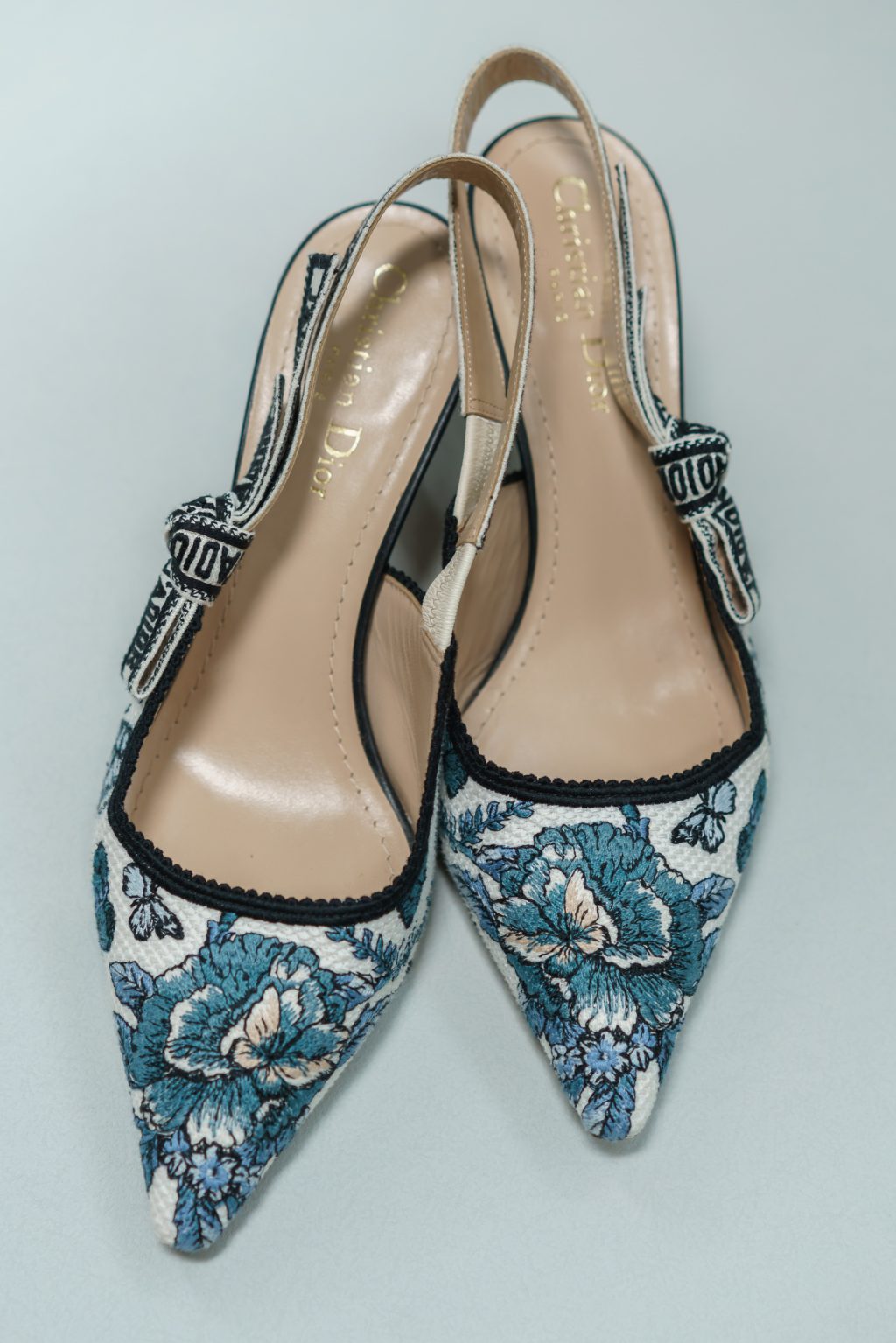 Blue embroidered Dior bridal shoes selected for a classic Austin wedding