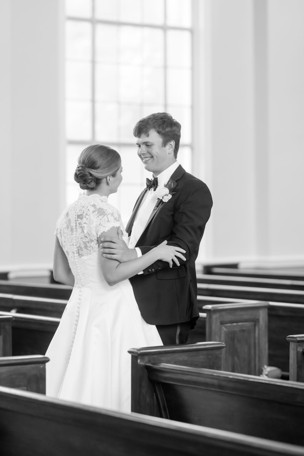 Black and white portrait of Maddy and Will together inside Tarrytown United Methodist Church