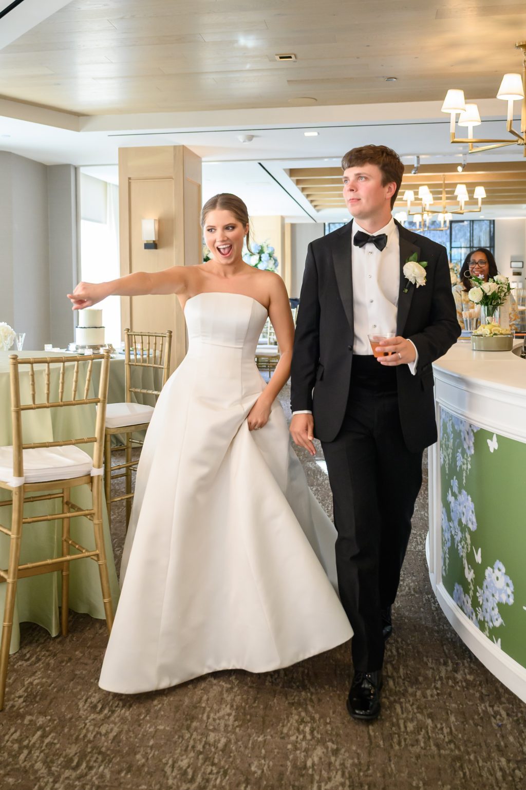 Maddy and Will make a joyful entrance into their Westwood Country Club reception