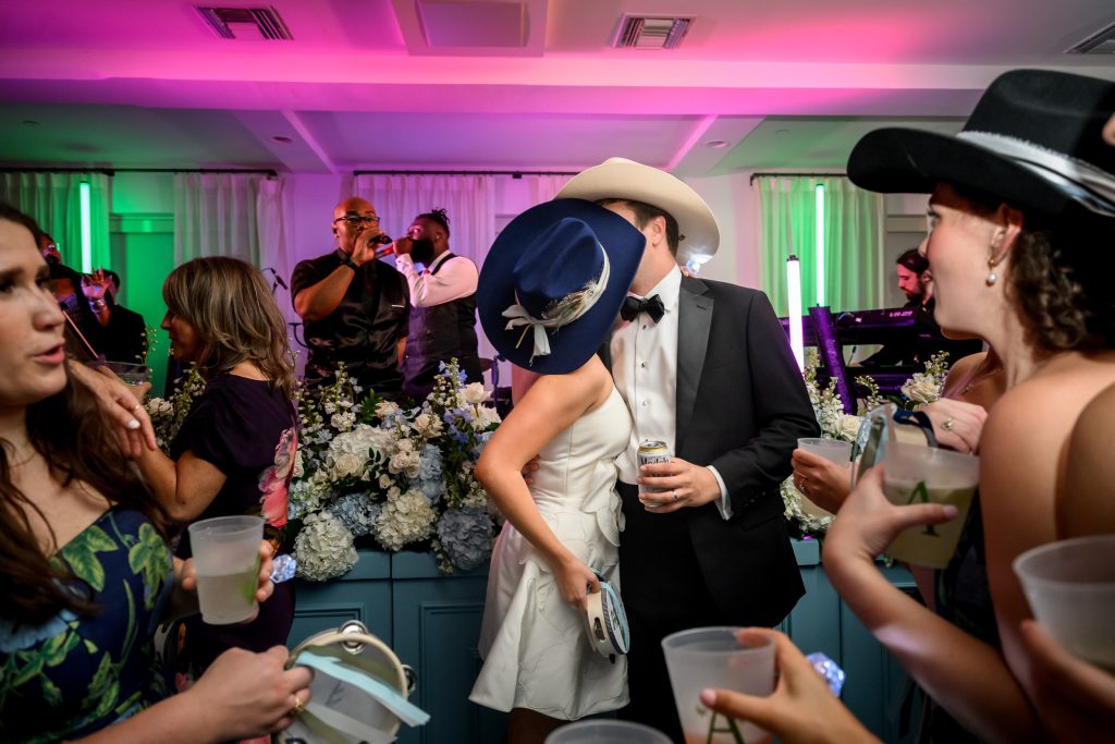 Maddy dances with guests during the late-night wedding celebration