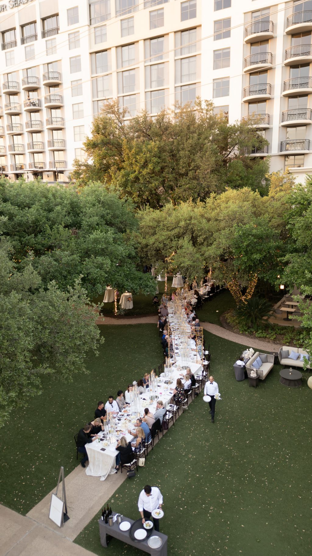 Small intimate dinner with long table at the four seasons lawn by WhittRoss
