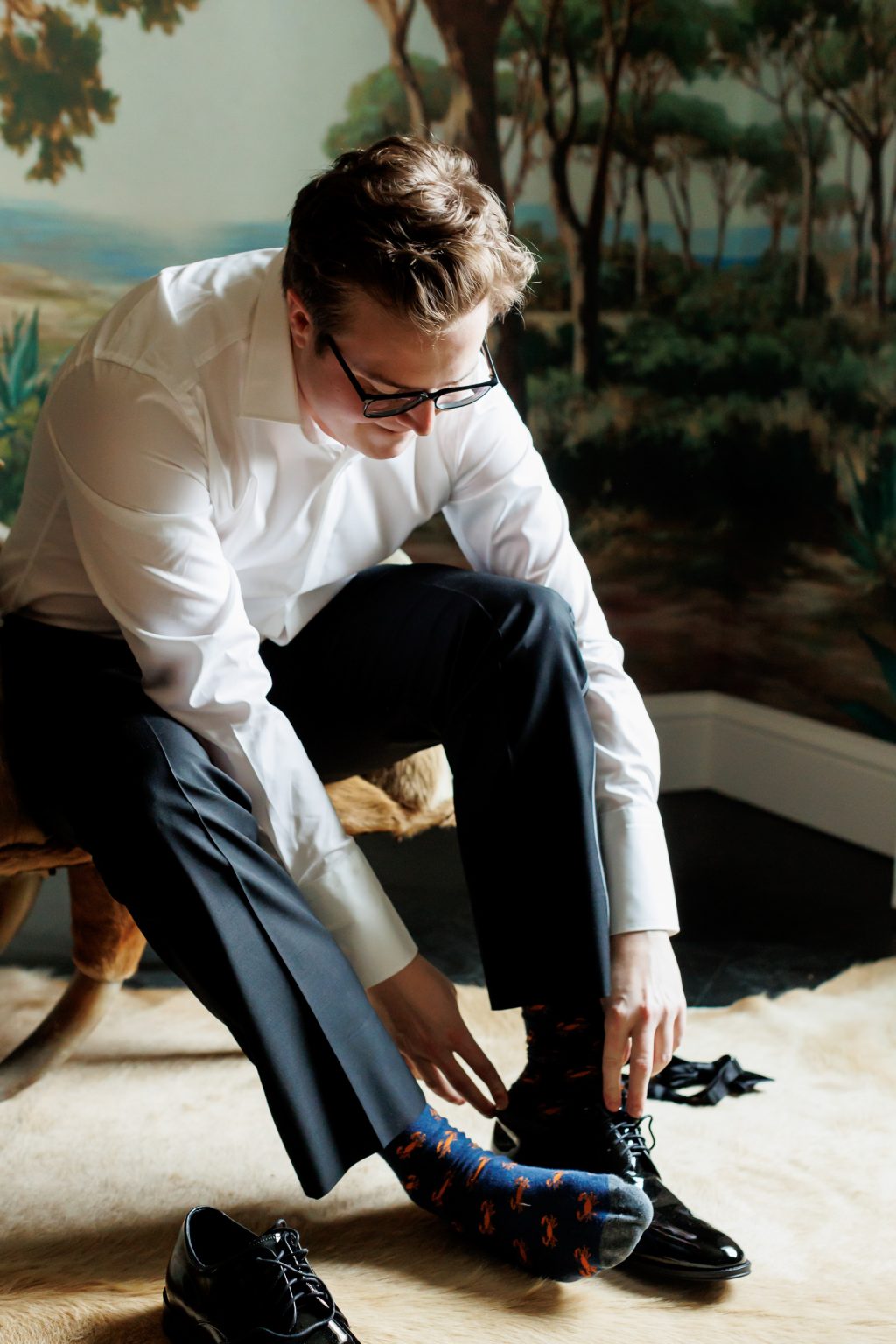 Groom getting ready in the Magnolia Suite before his Commodore Perry Estate wedding