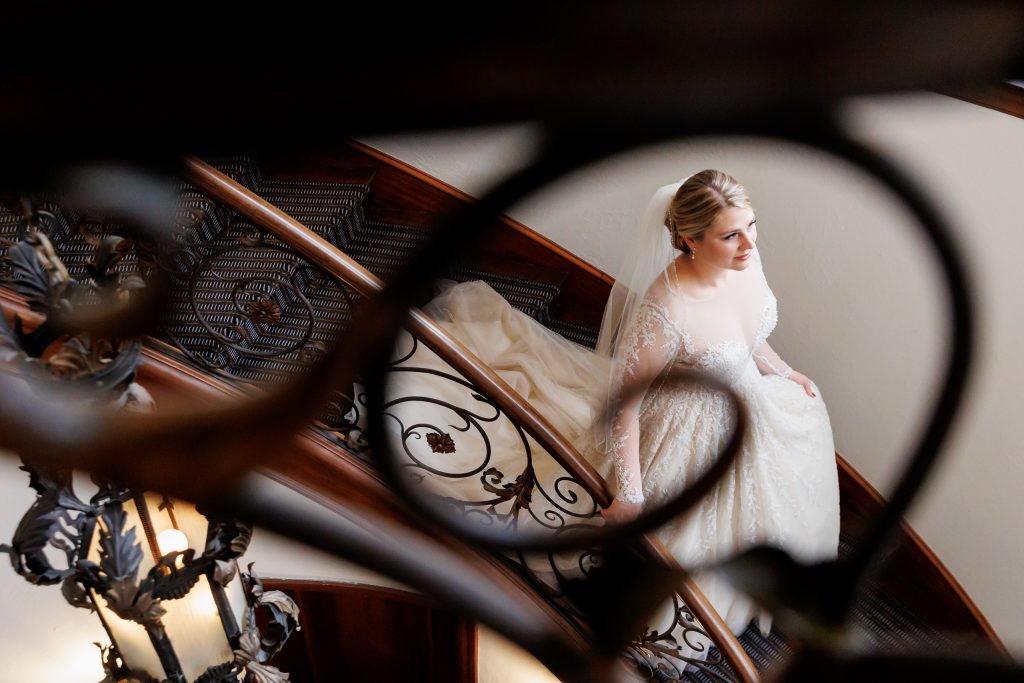 Bridal portrait on the staircase at the Commodore Perry Estate mansion