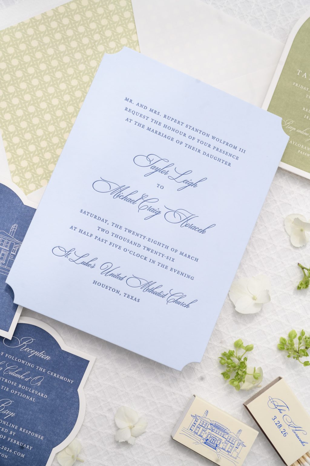 Blue and green wedding paper details photographed for a La Colombe d’Or Houston wedding