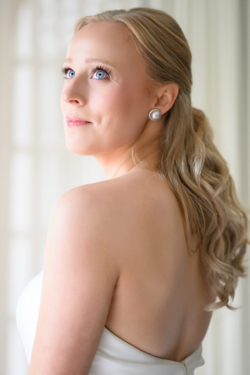 Close-up bridal portrait photographed inside La Colombe d’Or in Houston