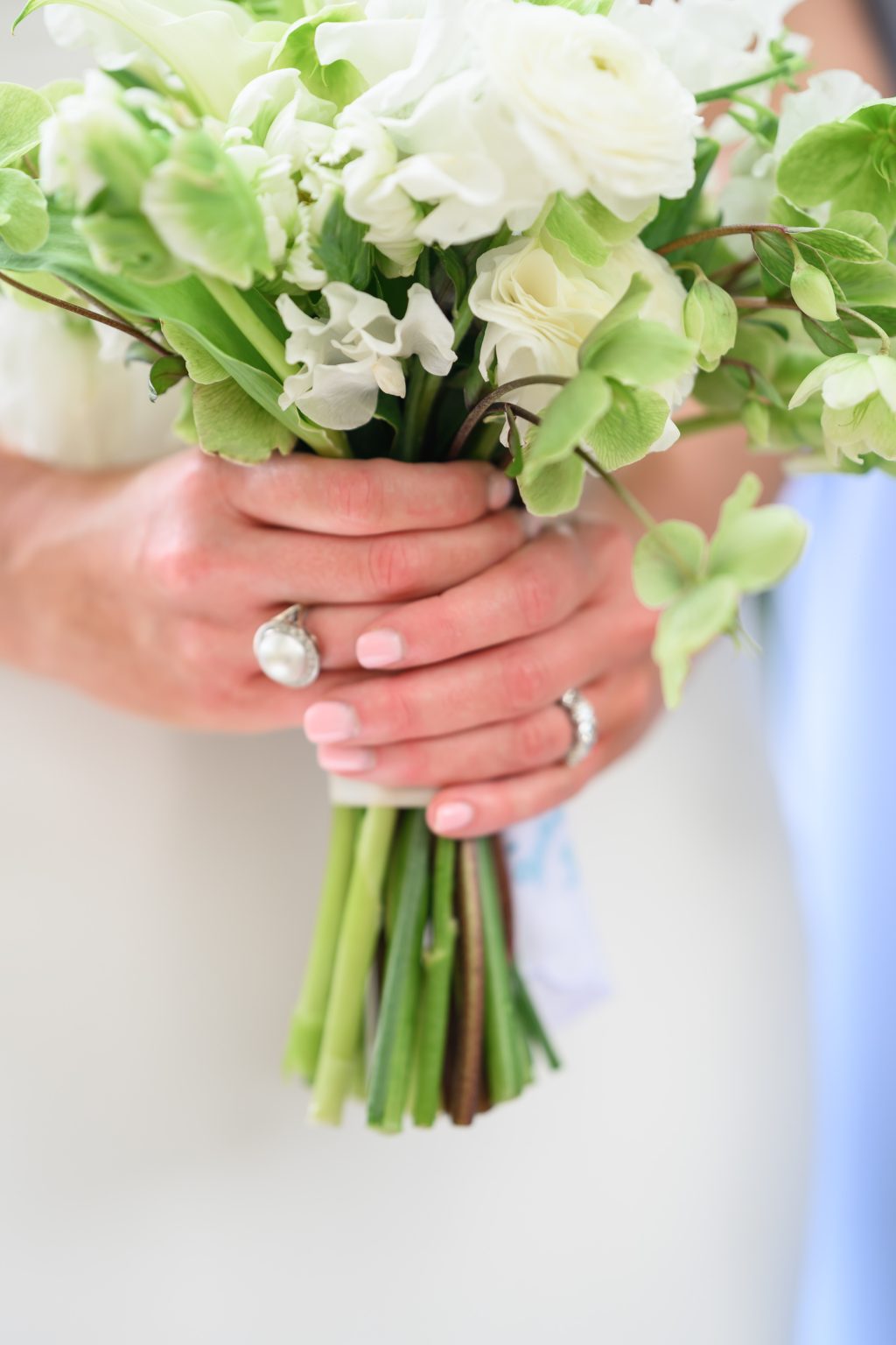 White and green bridal bouquet by Botanical No 9 at a Houston wedding
