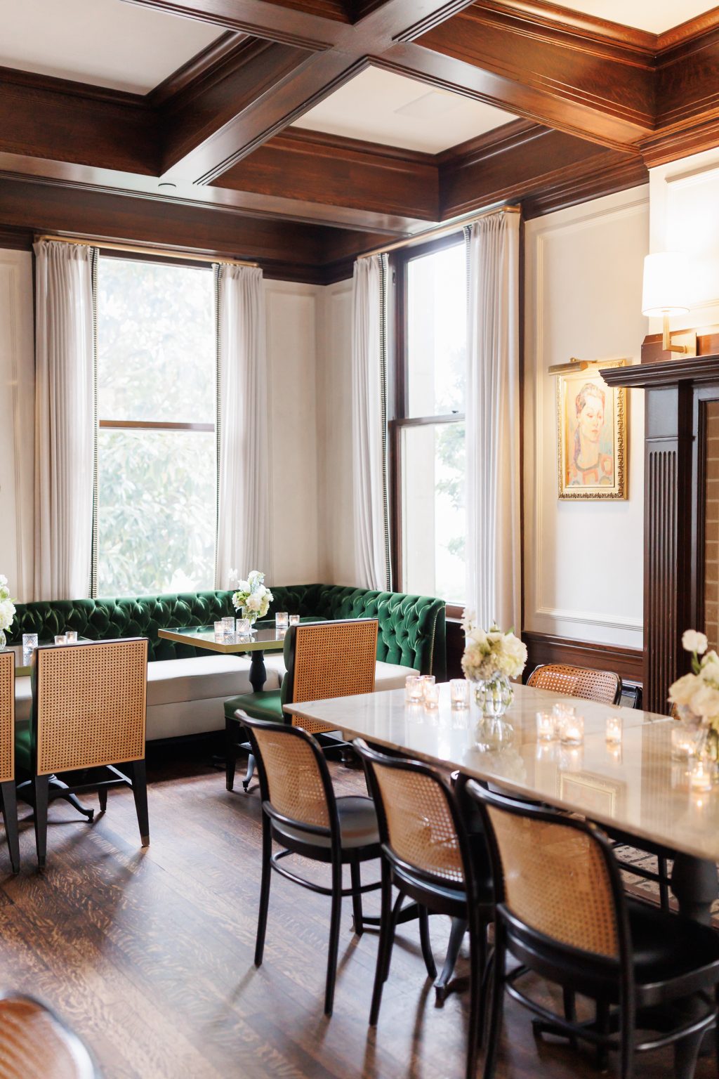 Wedding tables set inside one of La Colombe d’Or’s historic dining rooms