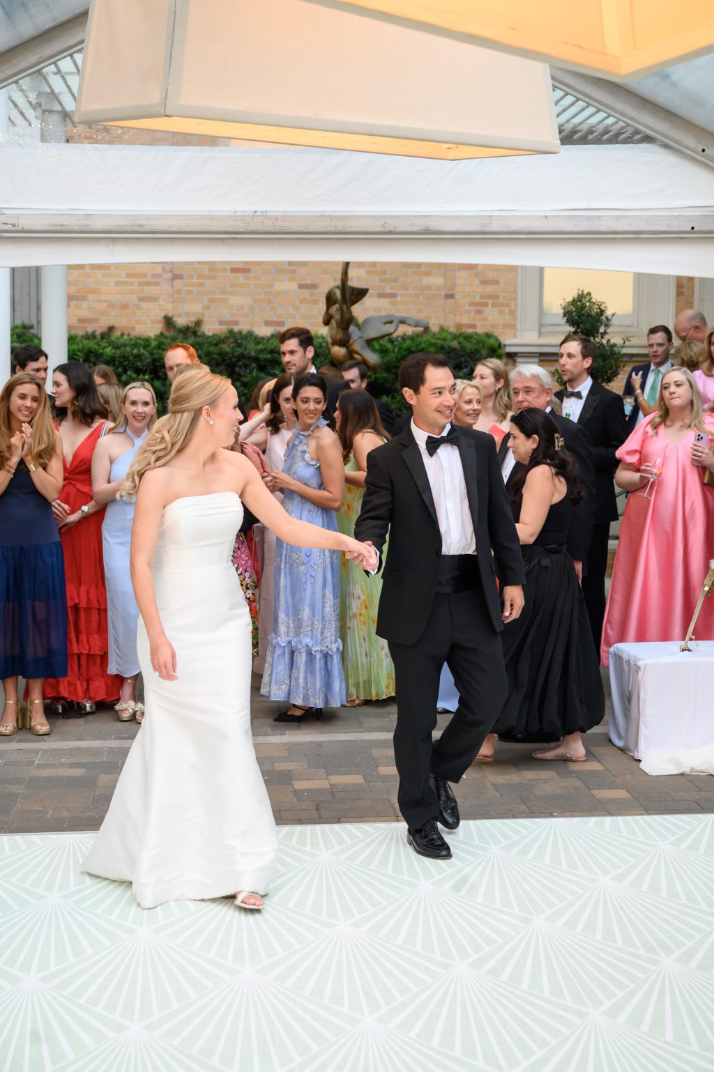 Bride and groom dancing beneath the tent during their La Colombe d’Or reception