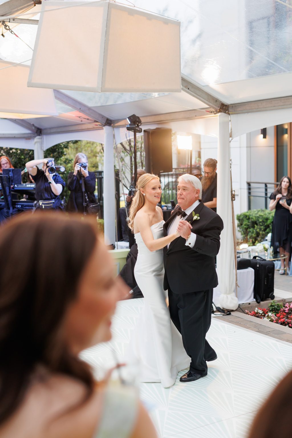 Bride dancing with her father beneath the reception tent at La Colombe d’Or