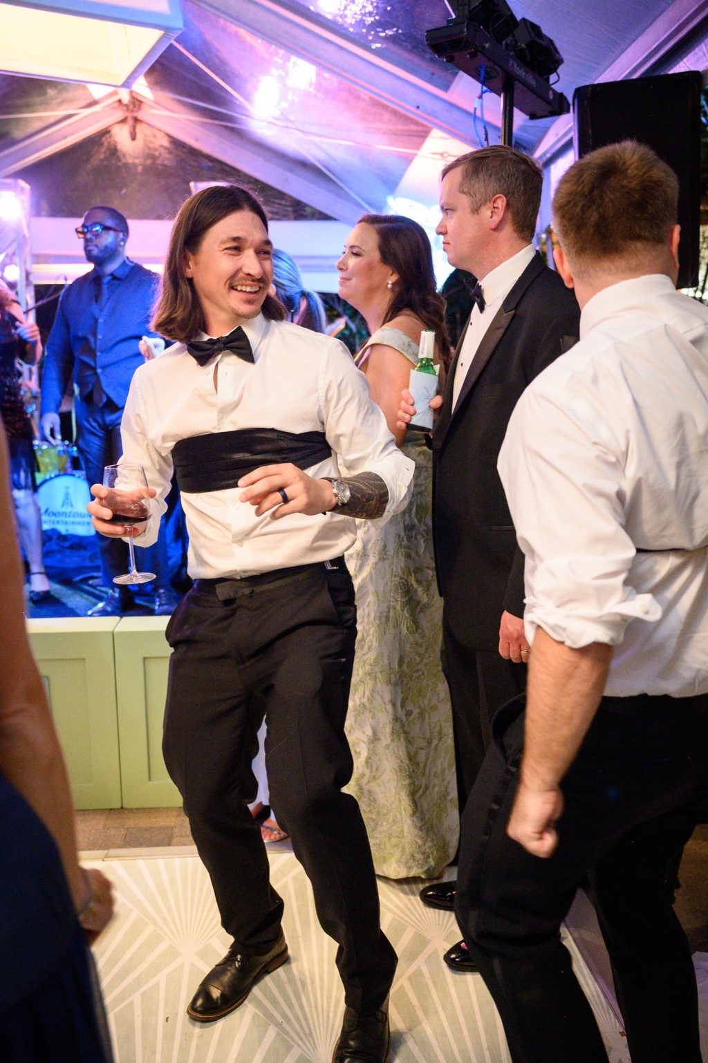 Matchmaker performing during the wedding reception at La Colombe d’Or in Houston