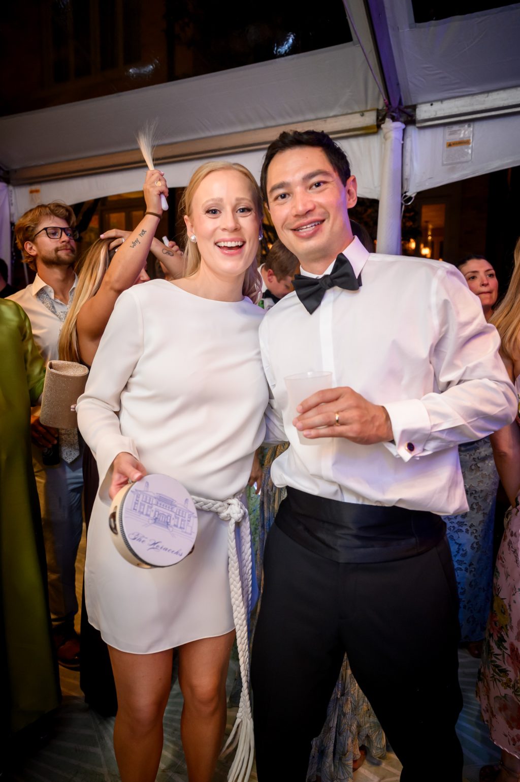 Bride and groom smiling together during their La Colombe d’Or wedding reception